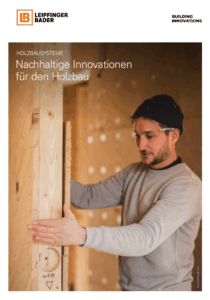 Mann arbeitet mit Holzbauprodukte in einem Holzbau.